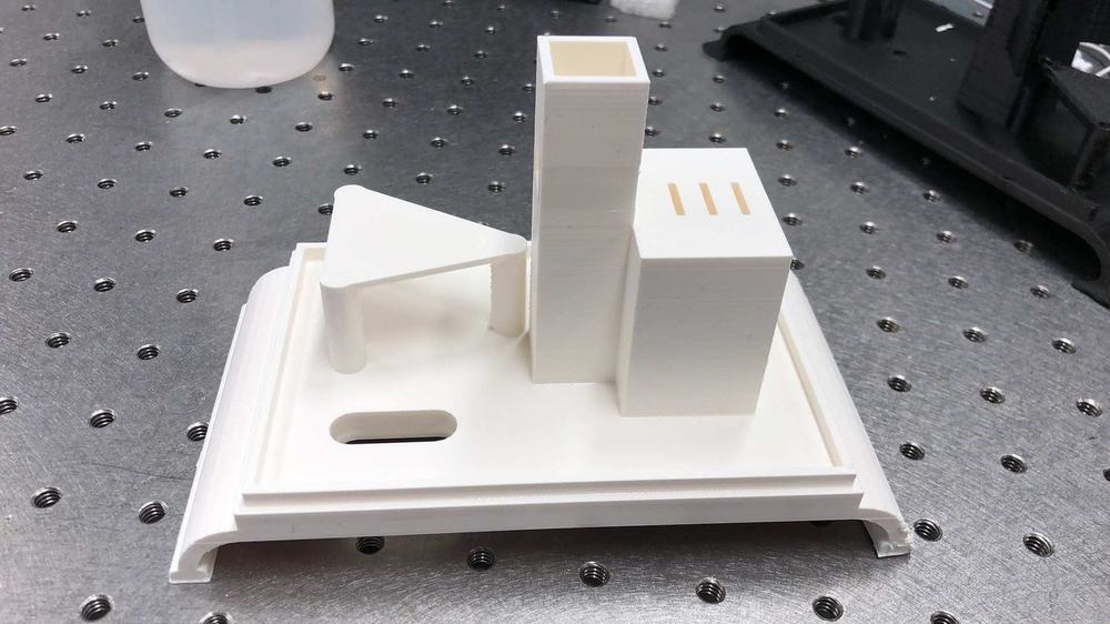 Cuvette holder for melamine spectrometer